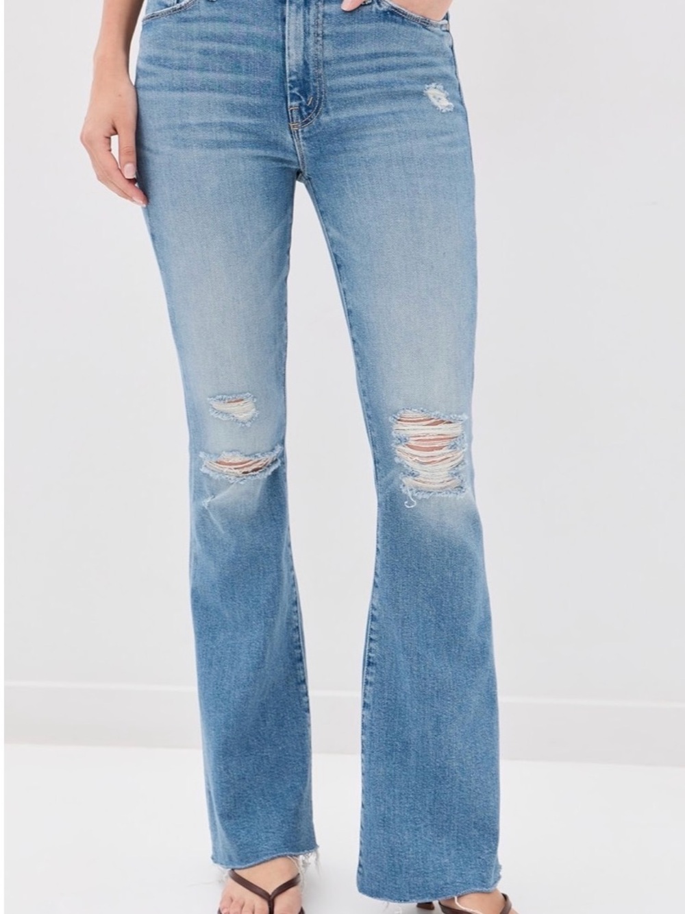 MOTHER ‘The Weekender” Distressed Flare Jeans